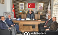 MHP heyeti Başkan Ateş tarafından misafir edildi