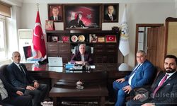 MHP'li A. Adayları Göreme Belediye Başkanını ziyaret etti