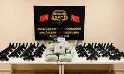 Silah kaçakçılarının evinde 13 kilo uyuşturucu ele geçirildi