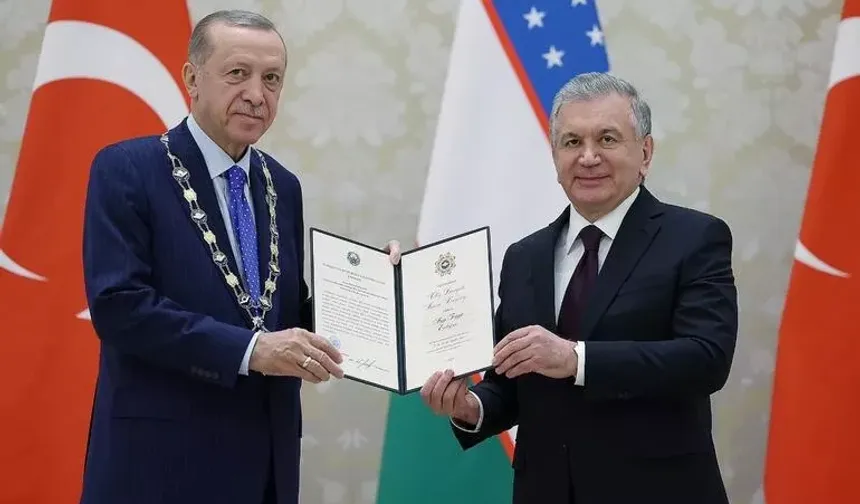 Erdoğan'a En Yüksek Düzeyli Devlet Nişanı takdim edildi.